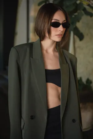 Crop top ajustado de tirantes bajo curveado